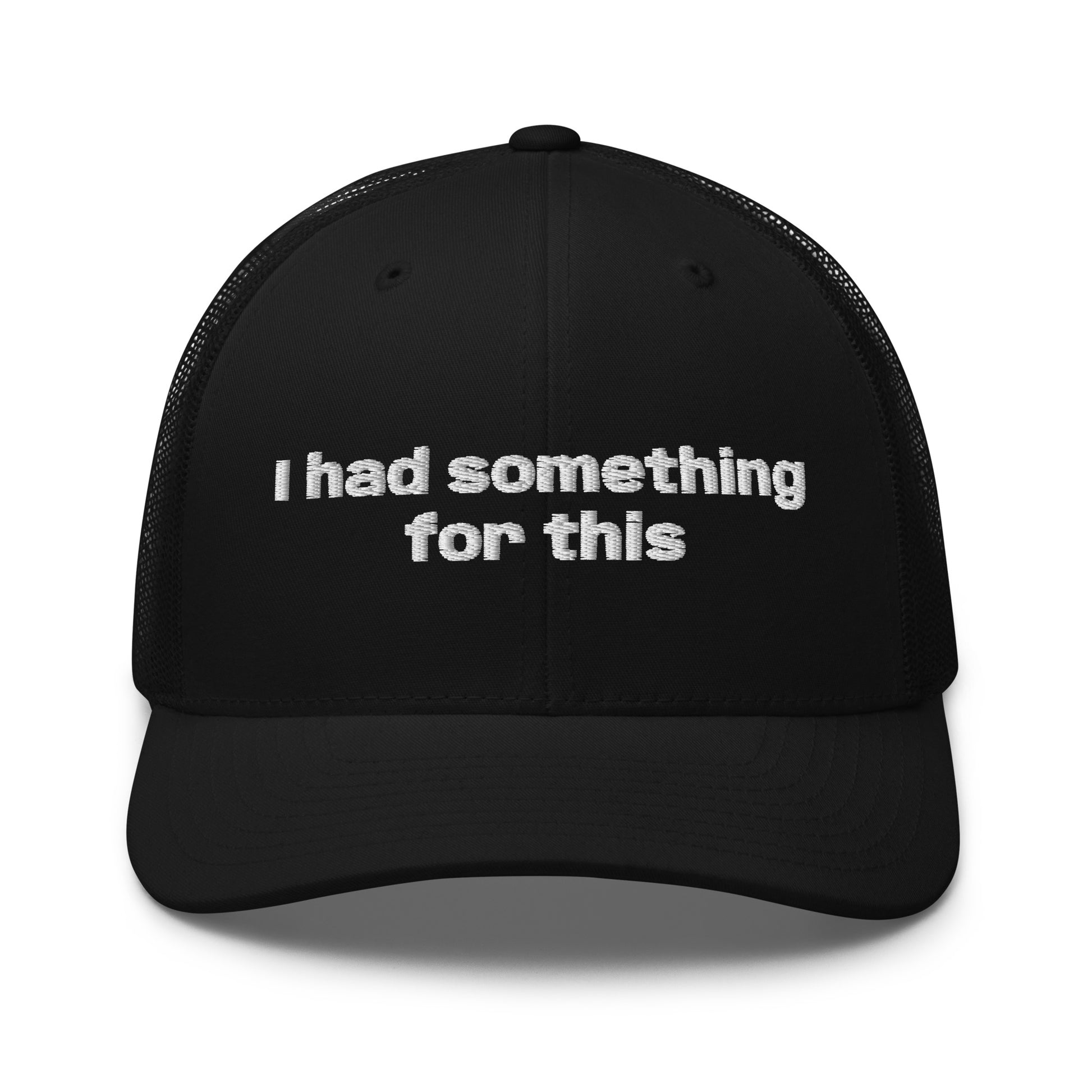 Black trucker hat with embroidered text reading “I had something for this.” Frankie Said Meow.