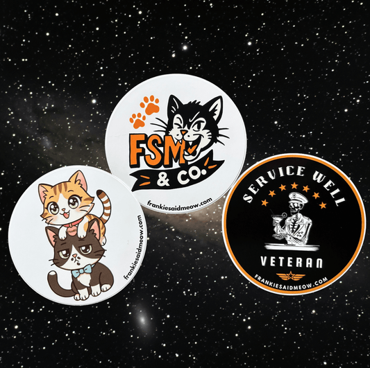 A photo of three glossy 3-inch round stickers from Frankie Said Meow. The set includes a chibi-style sticker of orange tabby Frankie sitting on tuxedo cat Coqui, a sticker of Coqui biting the FSM & Co. logo, and a vintage-inspired “Service Well Veteran” sticker with a skeleton bartender in uniform. All three are shown against a starry galaxy background.